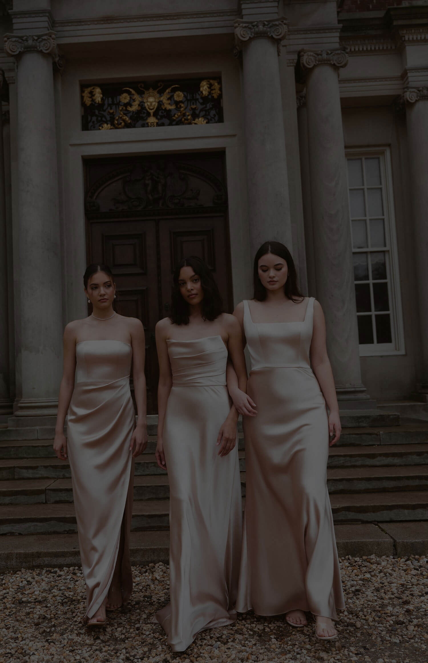 Models wearing a white dresses. Mobile image