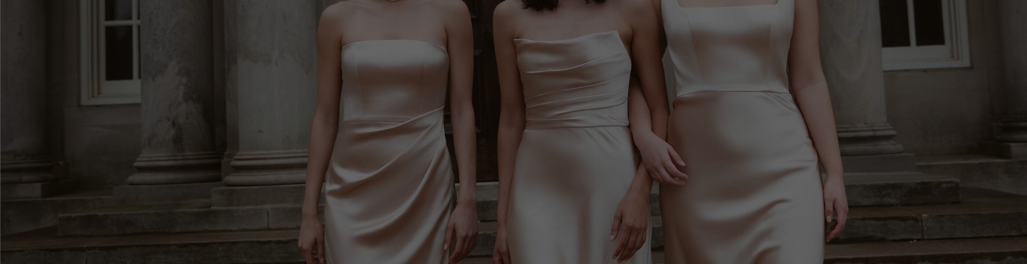 Models wearing a white dresses